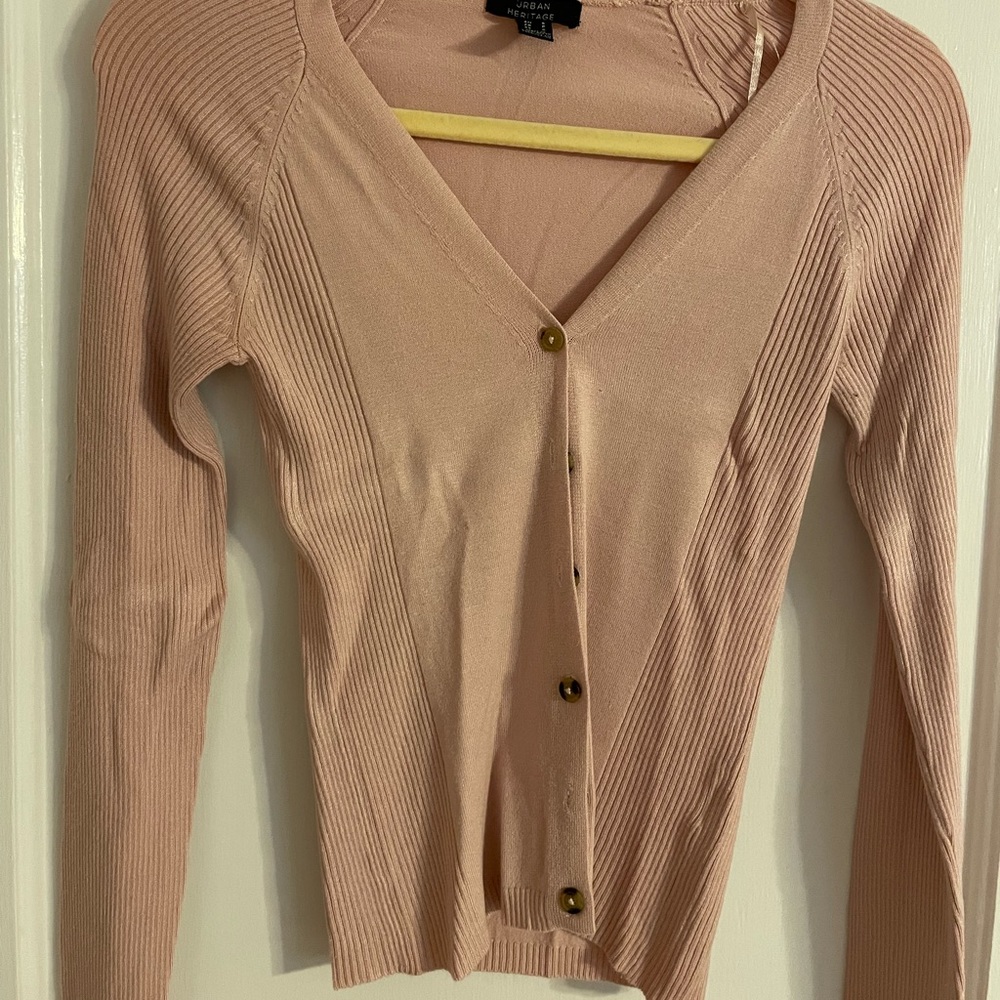 Gorgeous slightly worn button-up cardigan from Urban Heritage.